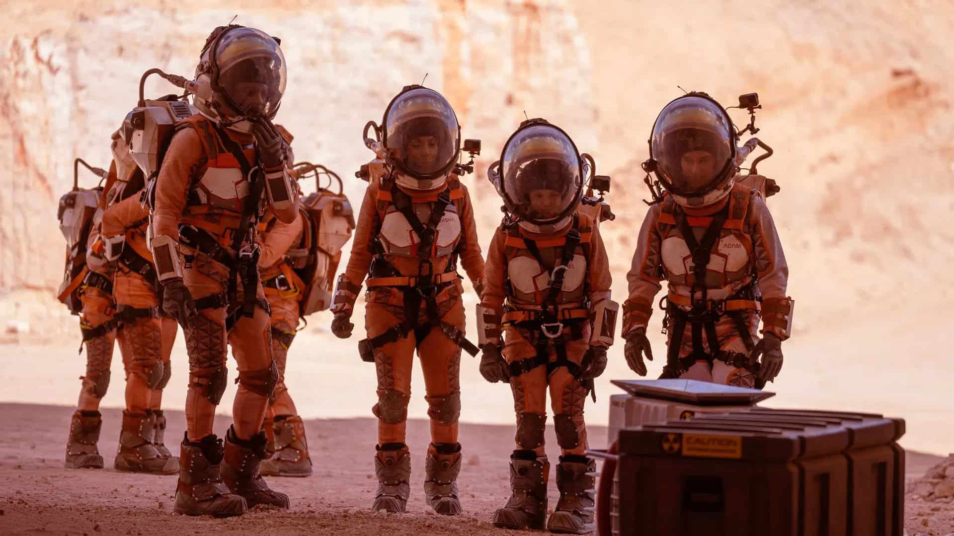 Contestants geared up in space suits in this image from FOX